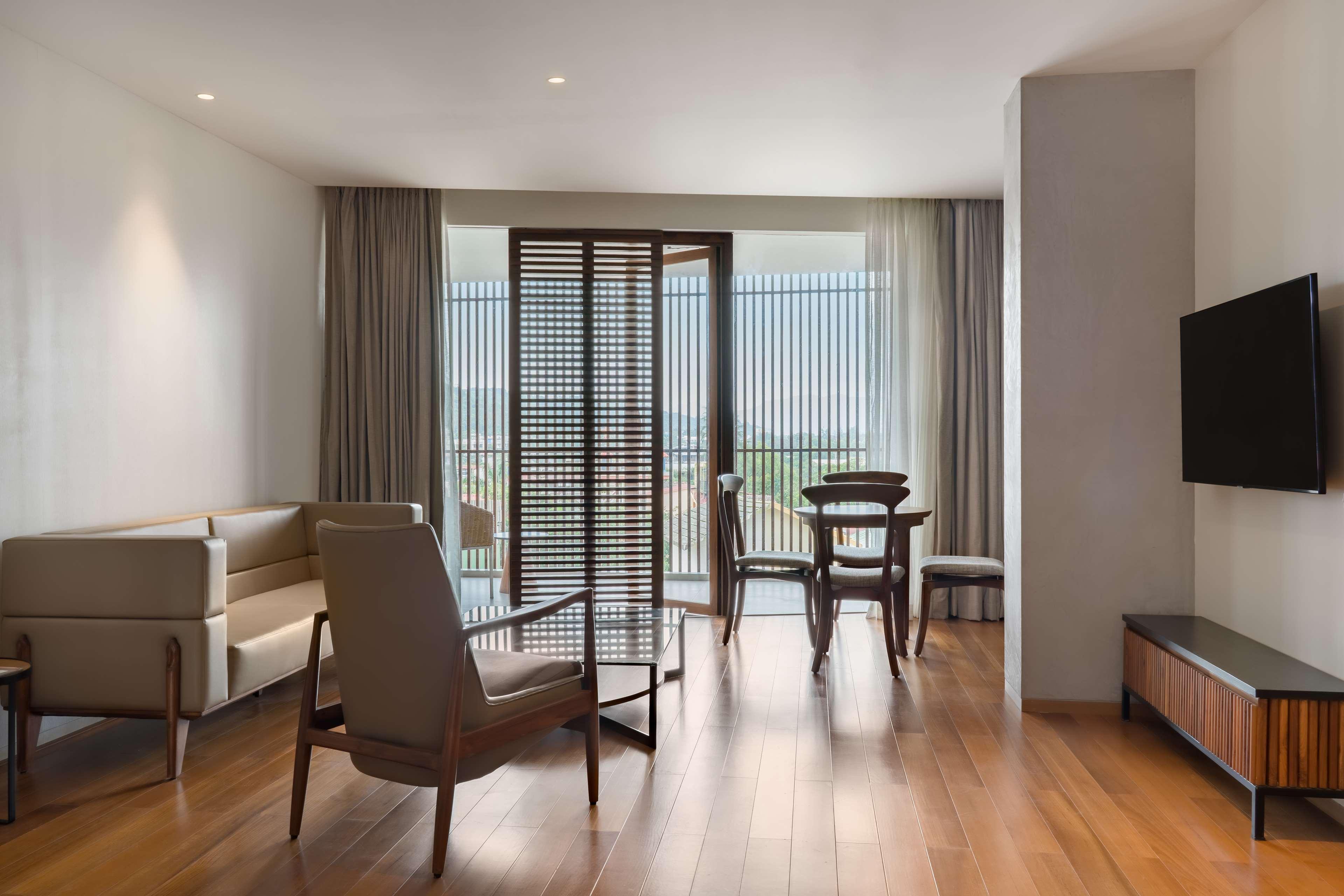 Radisson Resort&Spa Lonavala Esterno foto A typical living room in a typical apartment