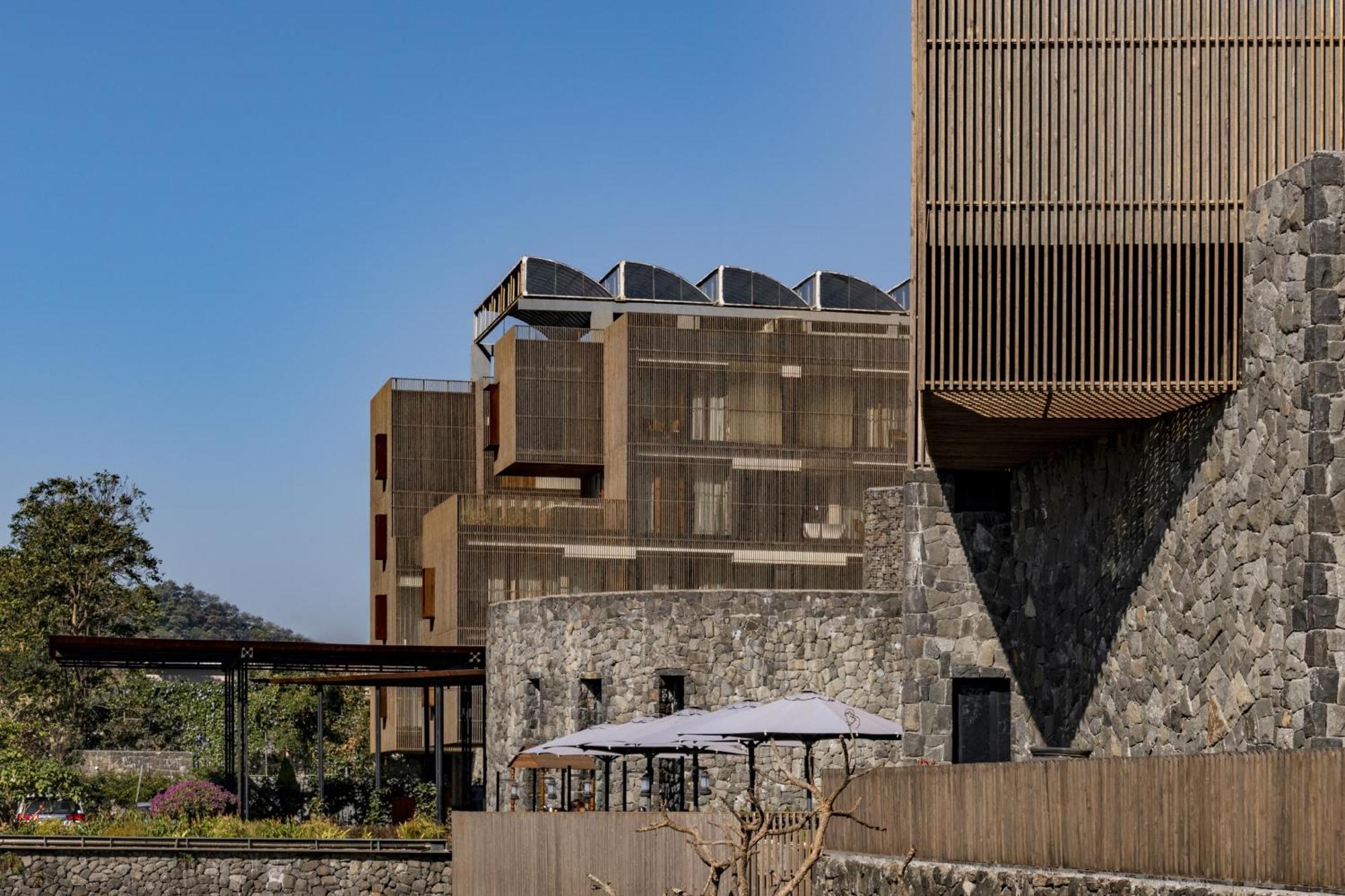 Radisson Resort&Spa Lonavala Esterno foto The hotel's main building