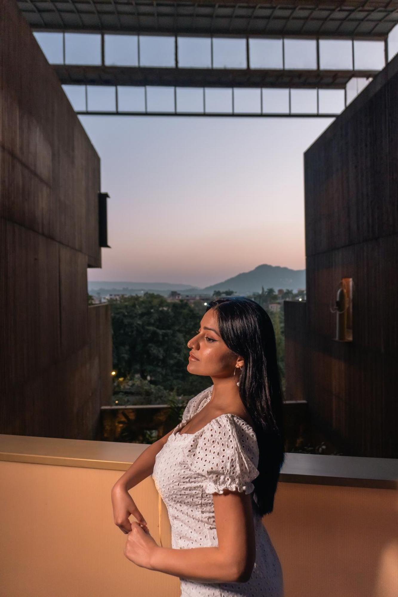 Radisson Resort&Spa Lonavala Esterno foto A woman in contemplation
